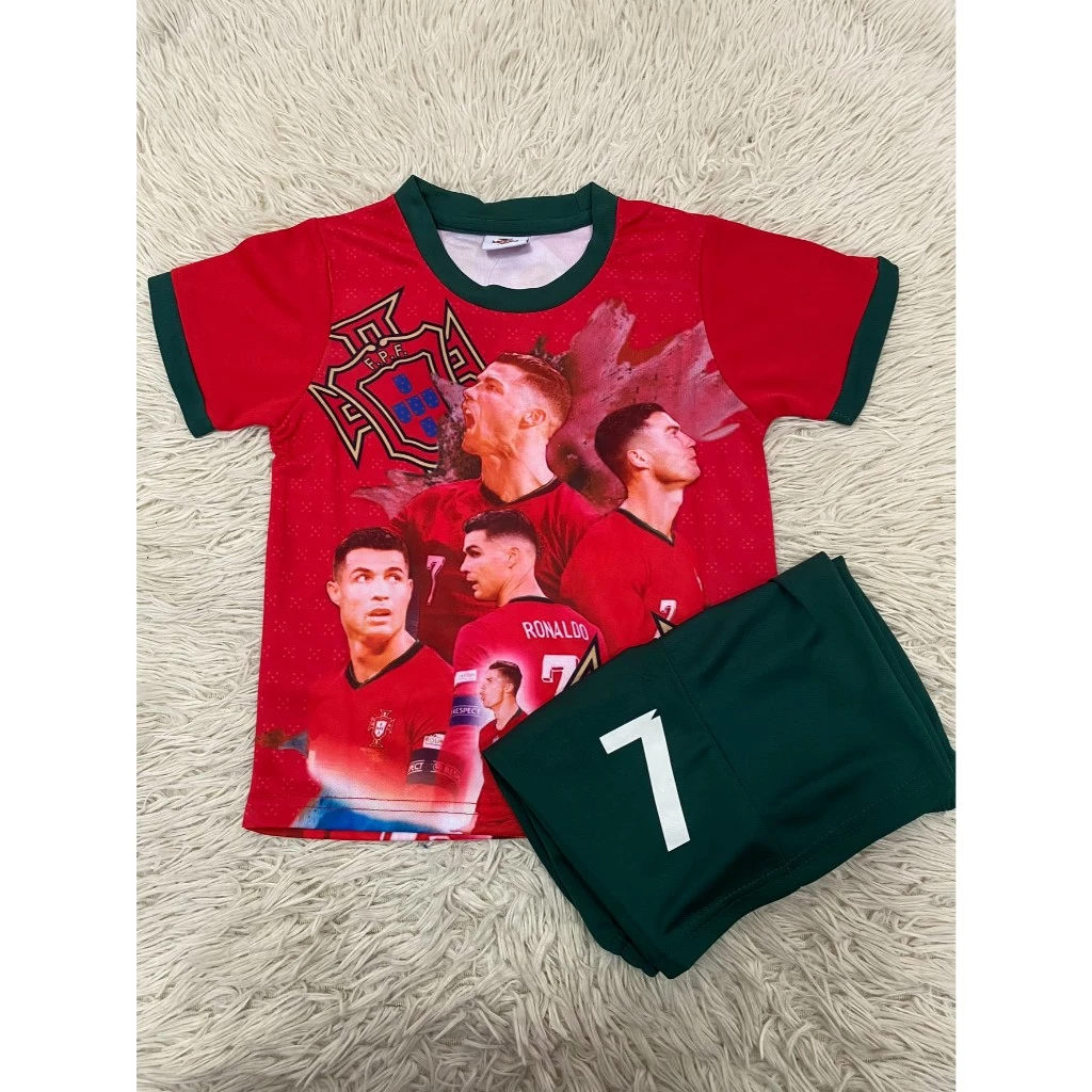 เสื้อบอลเด็กลายโปรตุเกสเบอร์7ชื่อโรนัลโด้ ใหม่ล่าสุด เสื้อพร้อมกางเกง ราคาถูก