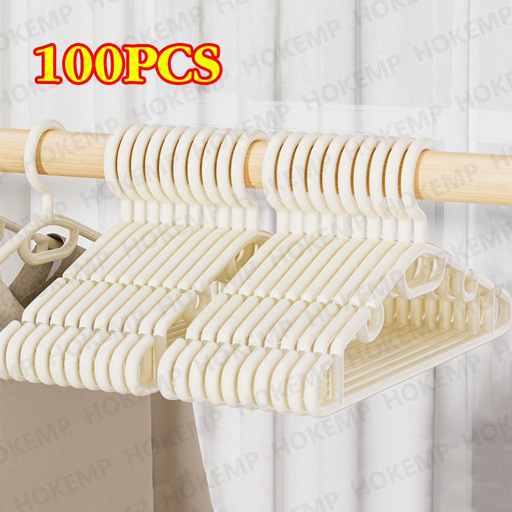 100PCS ไม้แขวนเสื้อพลาสติกกันลื่นสีขาว แพ็ค เหมาะสำหรับจัดระเบียบตู้เสื้อผ้า ไม้แขวนเสื้อพลาสติกบาง ไม้แขวนเสื้อ
