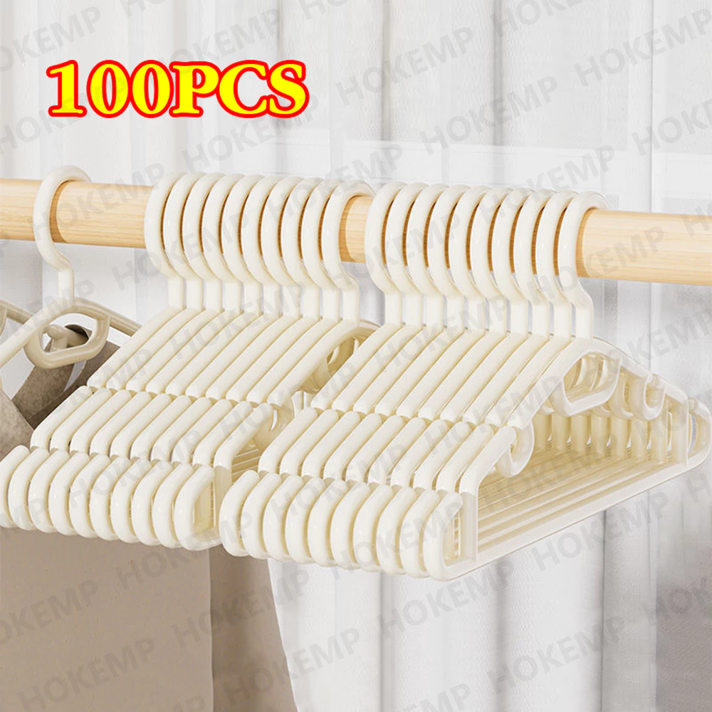 100PCS ไม้แขวนเสื้อพลาสติกกันลื่นสีขาว แพ็ค เหมาะสำหรับจัดระเบียบตู้เสื้อผ้า ไม้แขวนเสื้อพลาสติกบาง ไม้แขวนเสื้อ