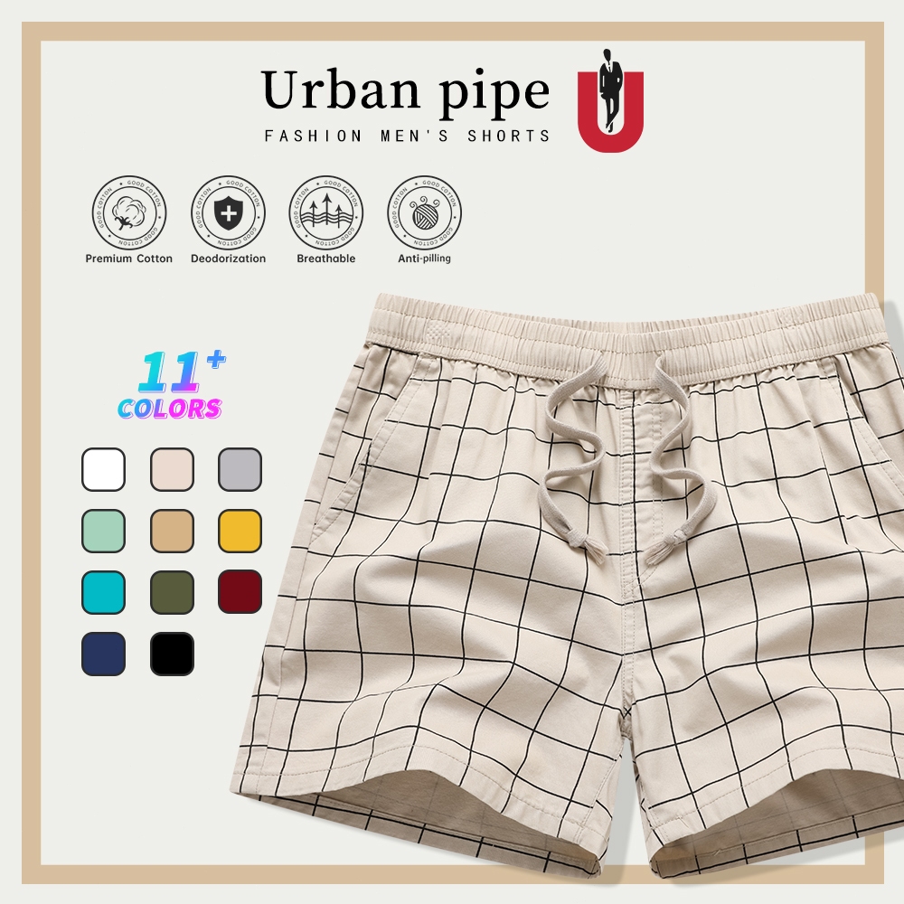 URBAN PIPE กางเกงขาสั้นผู้ชายลำลองรุ่นใหม่ปี 2026 ความยาวเหนือเข่า แบบกลาง สีเรียบ ดีไซน์ทันสมัย เอวยางยืด รหัส 520555