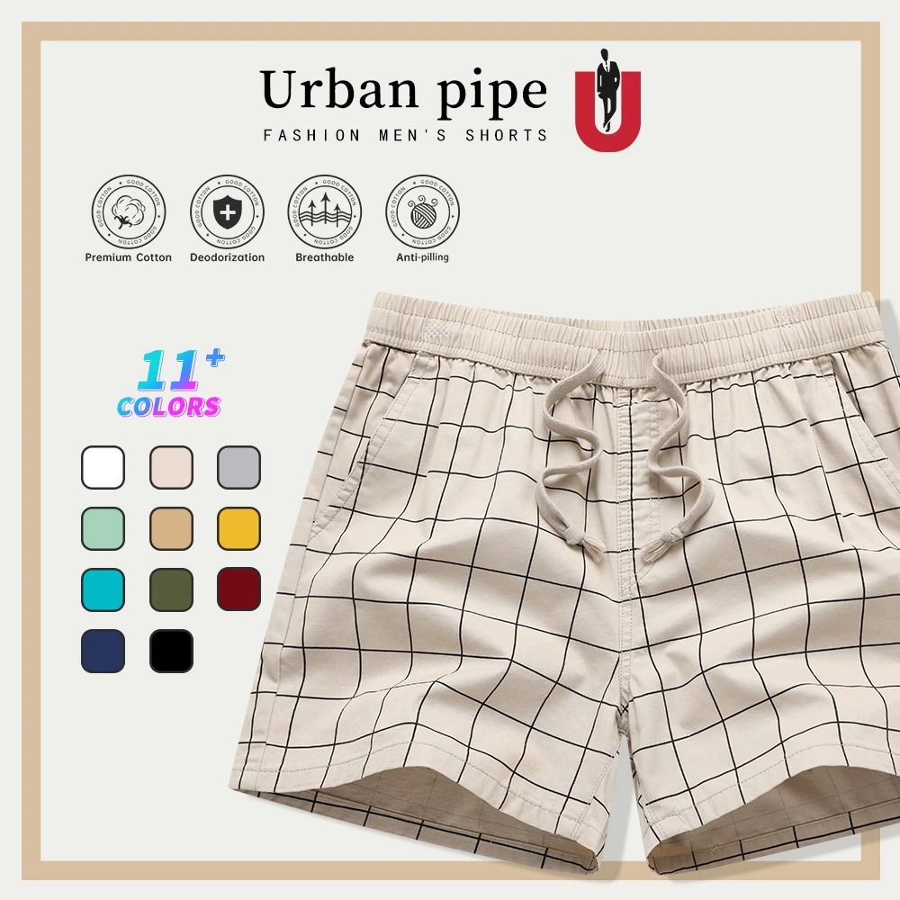 URBAN PIPE กางเกงขาสั้นผู้ชายลำลองรุ่นใหม่ปี 2026 ความยาวเหนือเข่า แบบกลาง สีเรียบ ดีไซน์ทันสมัย เอวยางยืด รหัส 520555