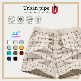 URBAN PIPE กางเกงขาสั้นผู้ชายลำลองรุ่นใหม่ปี 2026 ความยาวเหนือเข่า แบบกลาง สีเรียบ ดีไซน์ทันสมัย เอวยางยืด รหัส 520555