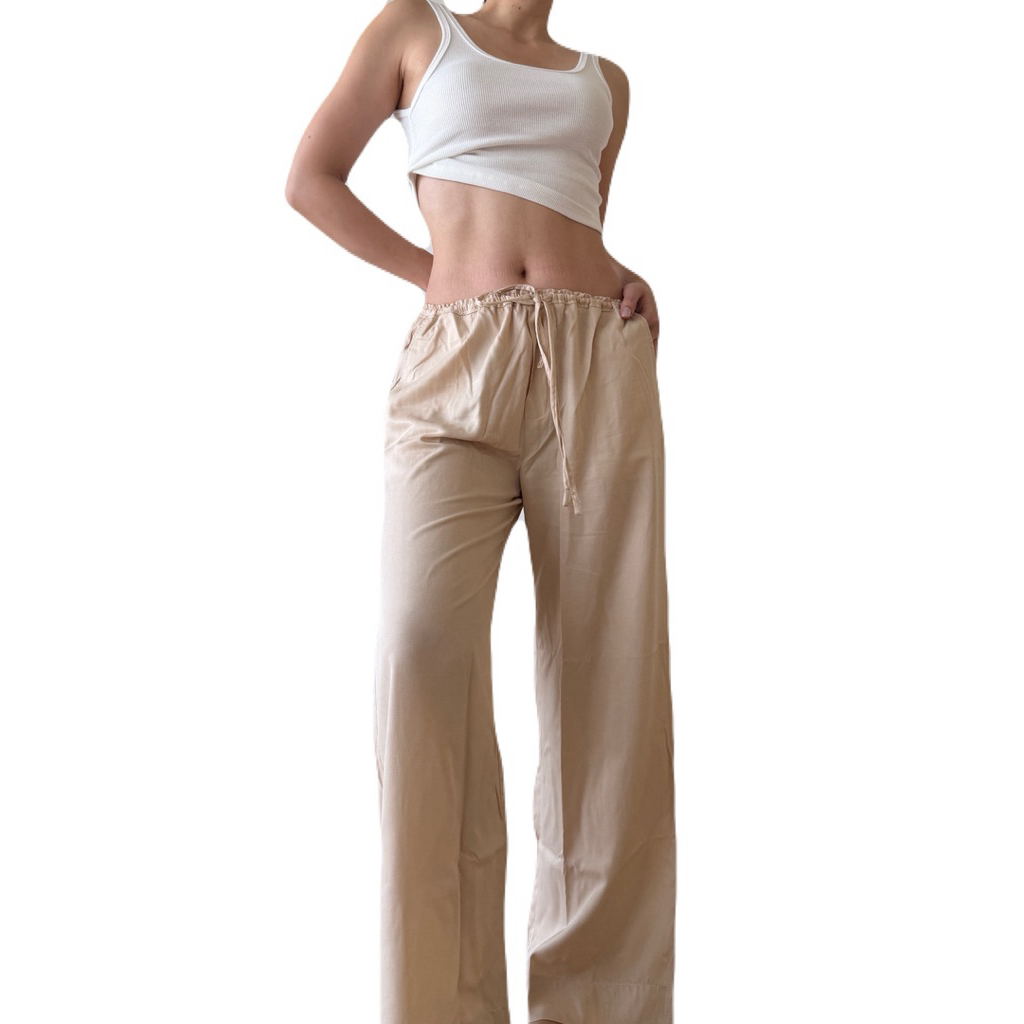SM66 กางเกงขายาวยางยืดเล็ก ผ้า silk japan สีครีม