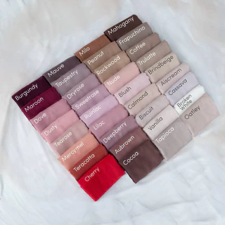 ฮิญาบสามเหลี่ยมนำเข้าจากอินโดนีเซีย สีพื้นรุ่นเลเซอร์คัท