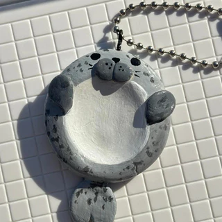 worry stone หินคลายกังวล น้องแมวน้ำ อุ๋งๆ งานดินปั้น handmade by นักปั้นหัวร้อน