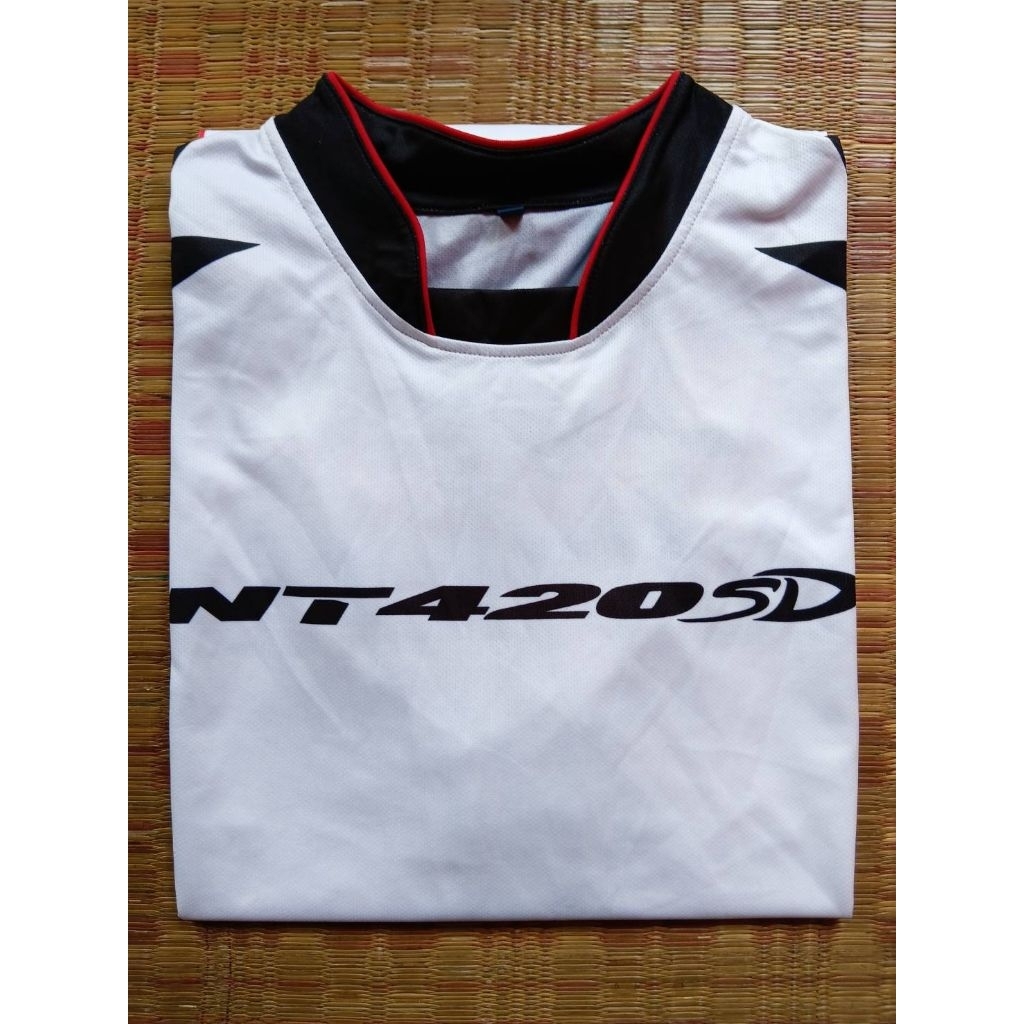 เสื้อโปรโมท ยางรถยนต์ Nitto NT420SD