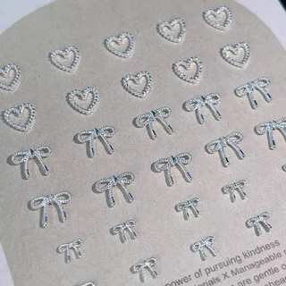 อะไหล่ติดเล็บ เครื่องประดับรูปหัวใจ โบว์ งานจริงน่ารักมาก 50ชิ้น/ห่อ สินค้าพร้อมส่ง