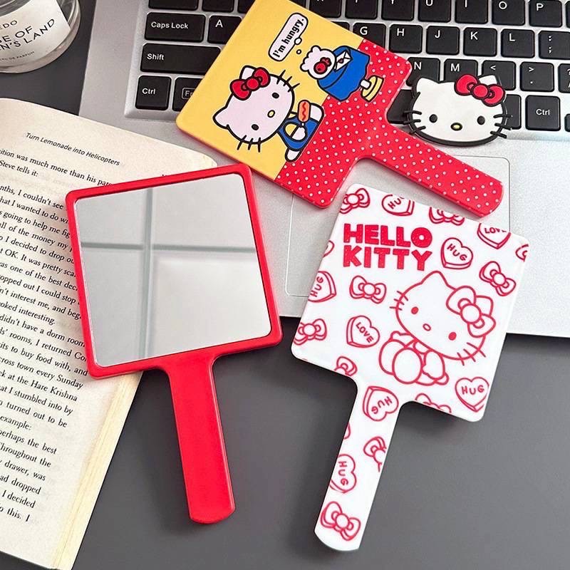 กระจกถือ Hello Kitty มี 3 สีลายน่ารัก น้ำหนักเบา ขนาด 9 x 16 cm