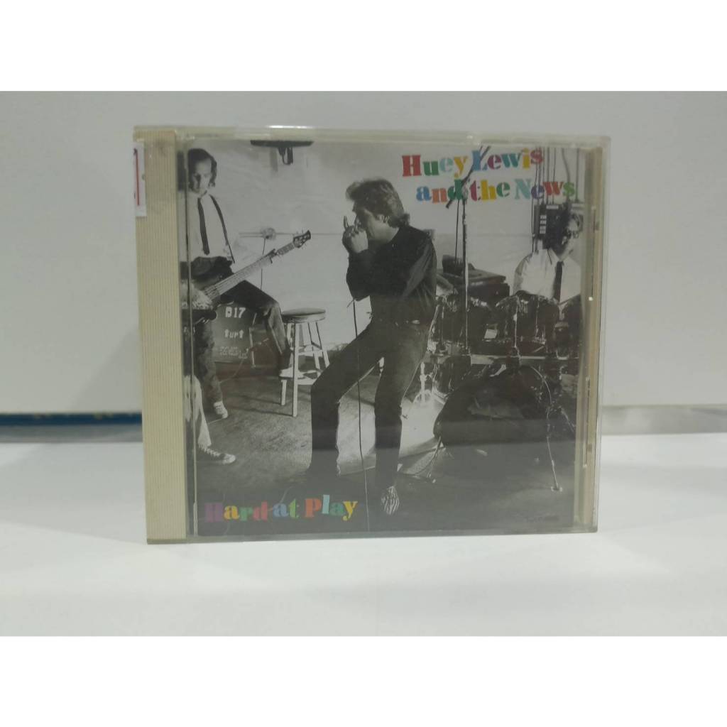 1 CD MUSIC ซีดีเพลงสากล  Hard at Play  Huey Lewis and the News   (B8C67)