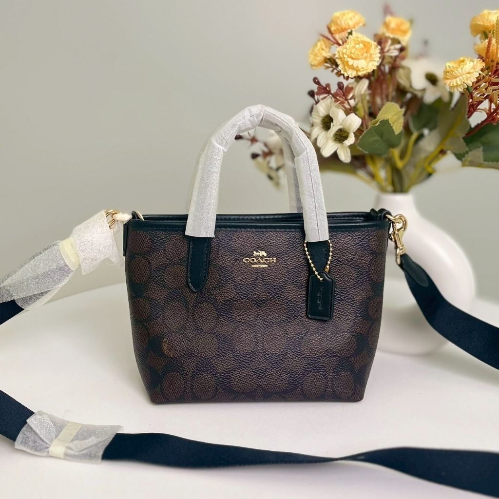 กระเป๋าสะพายข้าง Coach City Mini Tote Bag In Signature Canvas CW032
