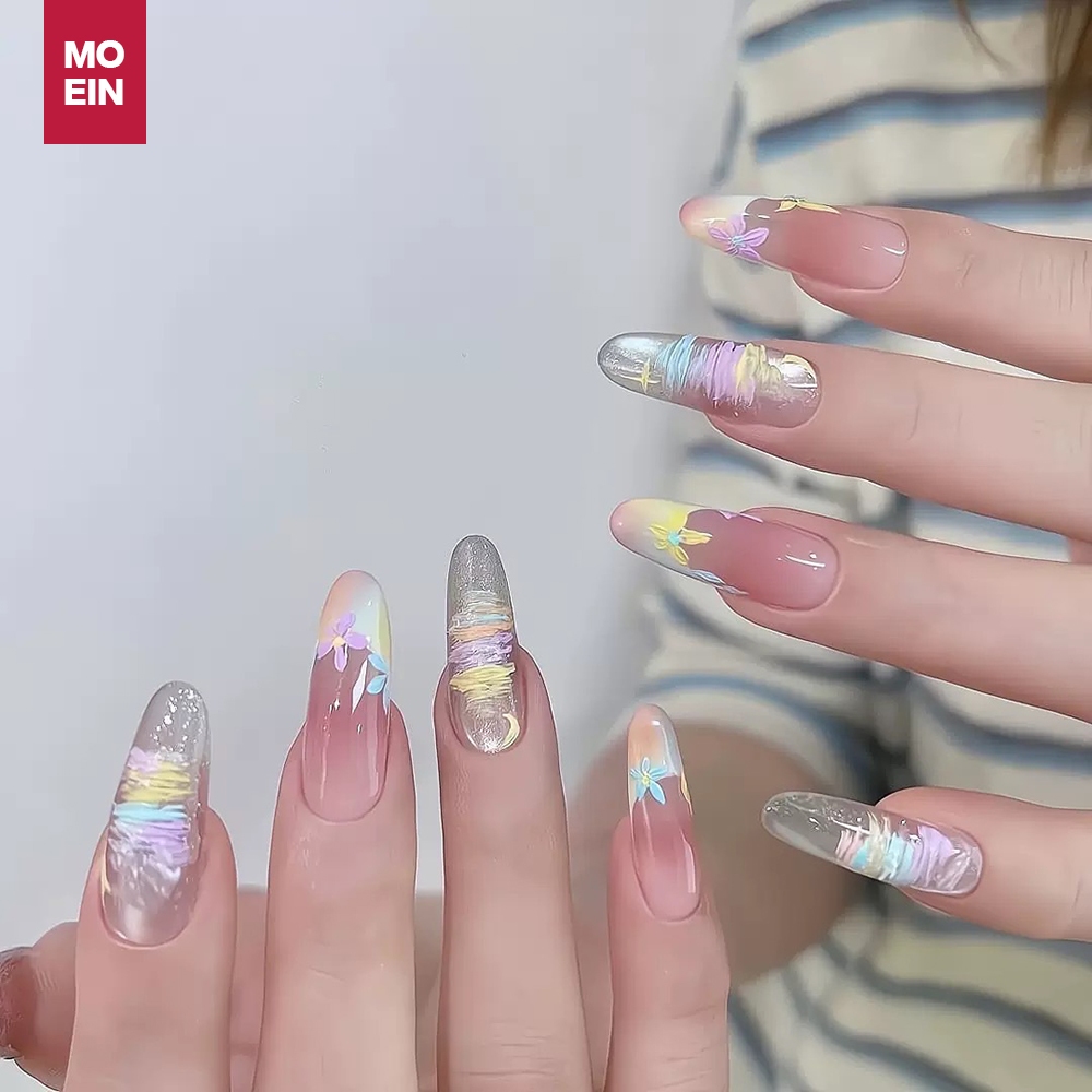 【ชุดเครื่องมือฟรี】เล็บปลอมสไตล์ฝรั่งเศส ลายดอกไม้สายรุ้ง ดาวทอง สีพาสเทล ยาวทรงอัลมอนด์ ติดง่าย ใช้ซ้ำได้