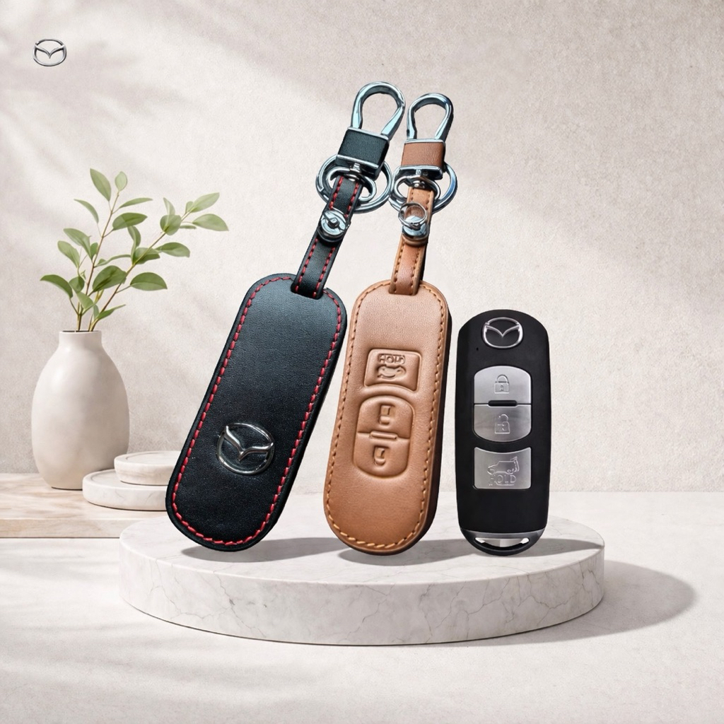ซองหนังแท้ ใส่กุญแจรีโมทรถยนต์ รุ่นหนังนิ่มโลโก้-เงิน Mazda 2,3/CX-3,5,8 Smart Key 3 ปุ่ม