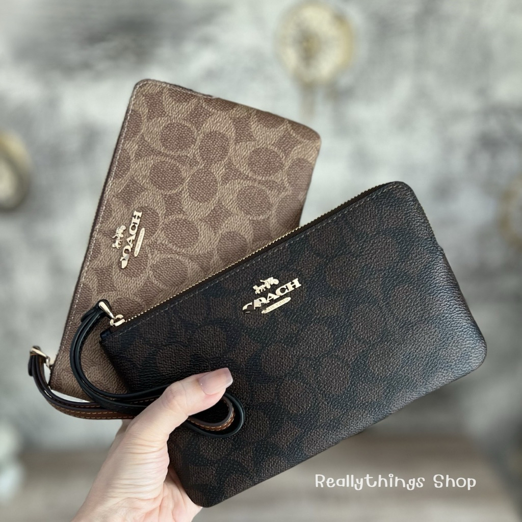 [ลดเพิ่ม:โค้ดคุ้ม+โค้ดร้านค้า]{แท้💯%📮พร้อมส่ง+ส่งฟรี} กระเป๋าคล้องมือ C. ไซส์ L 1 ซิป : Large Zip Wristlet CZ277