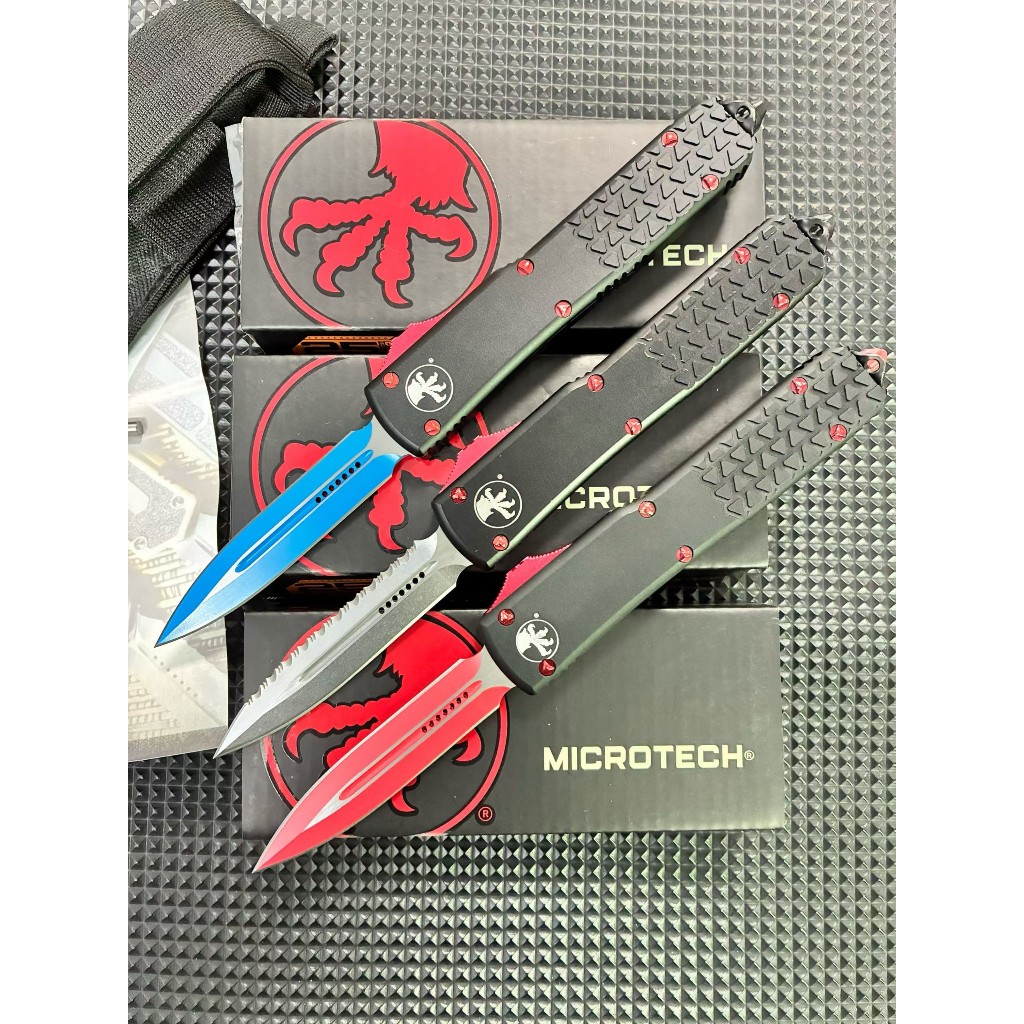 Microtech สามสี UT85 กระโดดตรง OFT วัสดุของใบมีด: 440 วัสดุก้าน: อลูมิเนียมอัลลอยด์การบิน T6