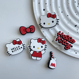 เสน่ห์การ์ตูนของรองเท้าแตะตลกแดง KT รูแมวเข็มหัวเข็ม DIY รองเท้าสตรีอุปกรณ์เสริมตกแต่ง