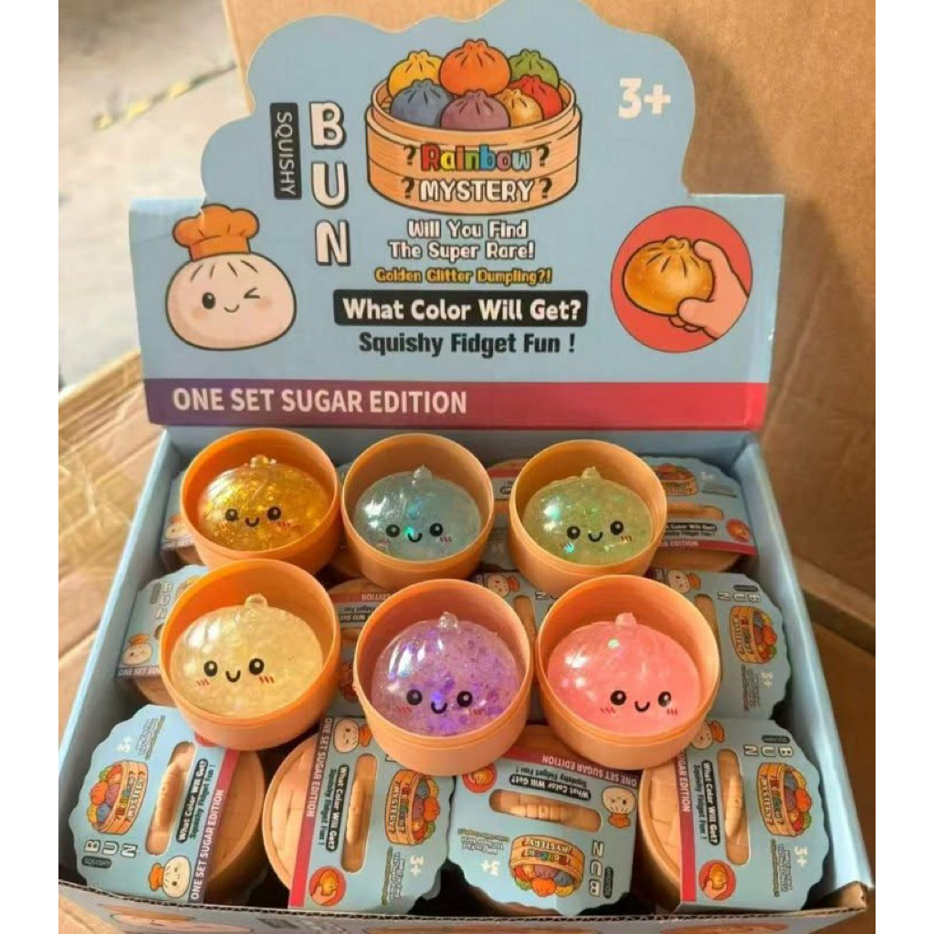 ของเล่นสกุชชี่ซาลาเปาใสกากเพชรในเข่งเล็ก