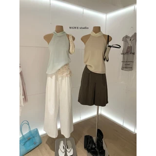 (พร้อมส่ง) เสื้อแขนกุดผูกโบว์หลัง - 10090 TAG WG.WE 🇰🇷