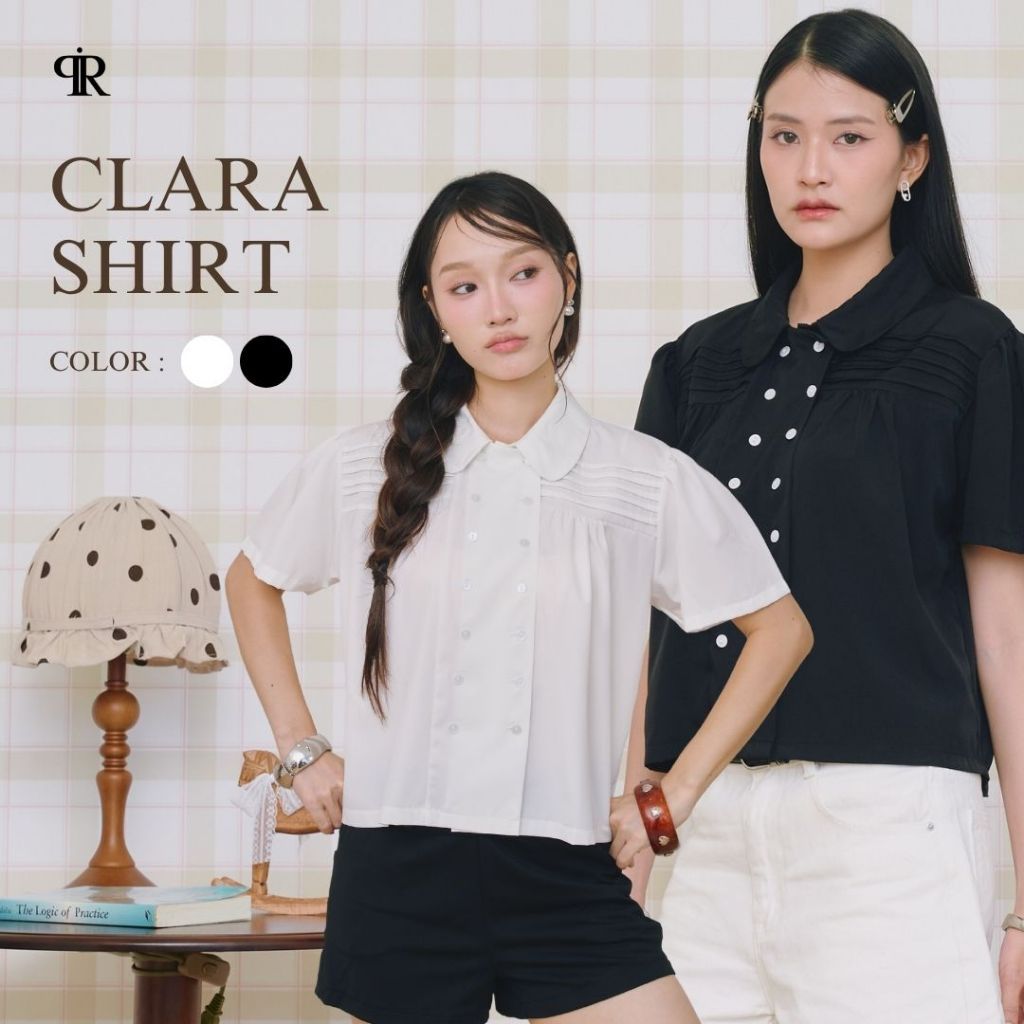 Panchitar Clara Shirt – เสื้อเชิ้ตคอบัวมนแขนสั้น พร้อมกระดุมสองแถวคู่เพิ่มลูกเล่นจับจีบระบายเล็กๆ ช่วงอก ดูเท่ คลาสสิก