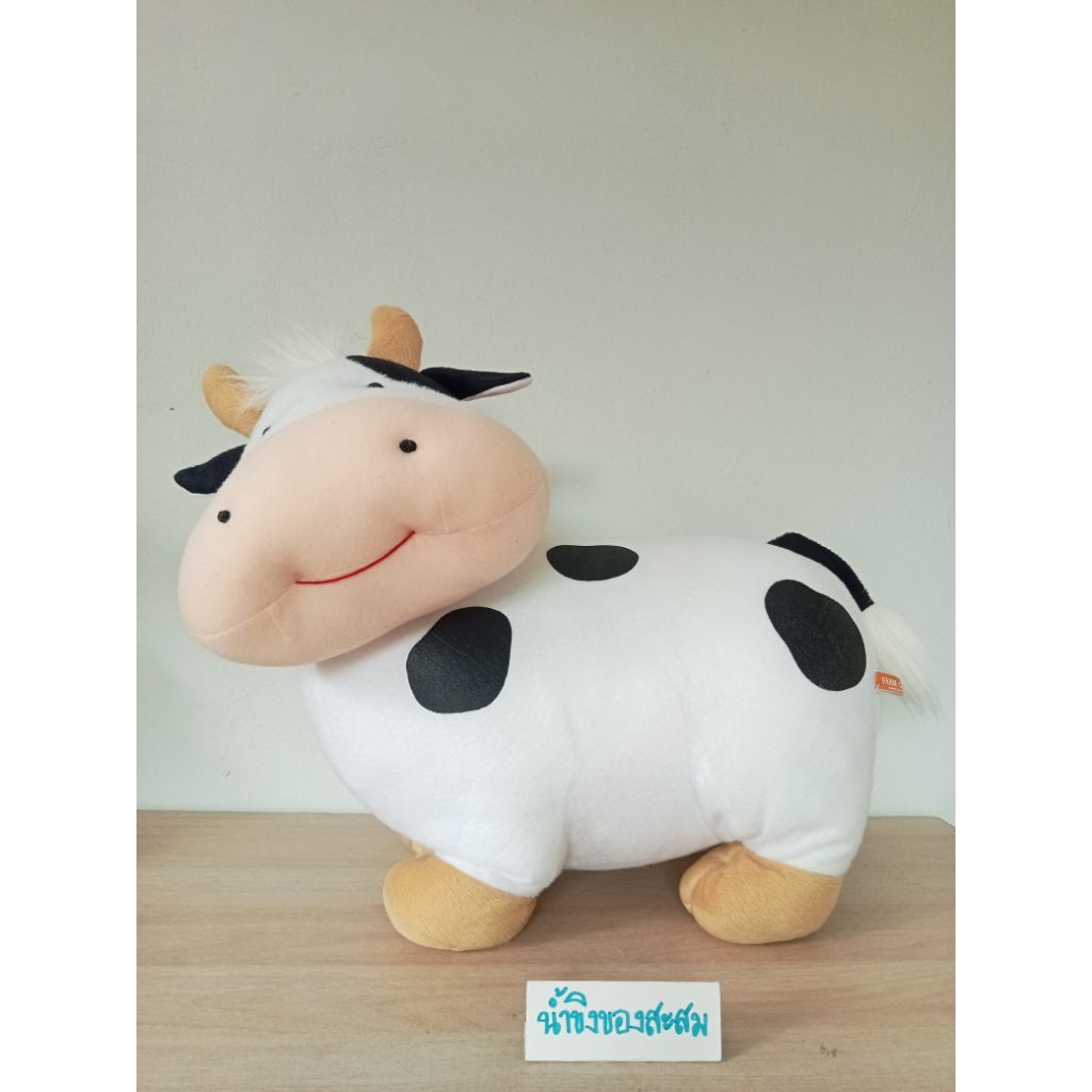 ตุ๊กตาวัว พรีเมี่ยม ฟาร์มโชคชัย "FARM CHOKCHAI"ขนาด : ความยาวประมาณ 18"**สินค้ามือสอง อาจมีตำหนิ หรื