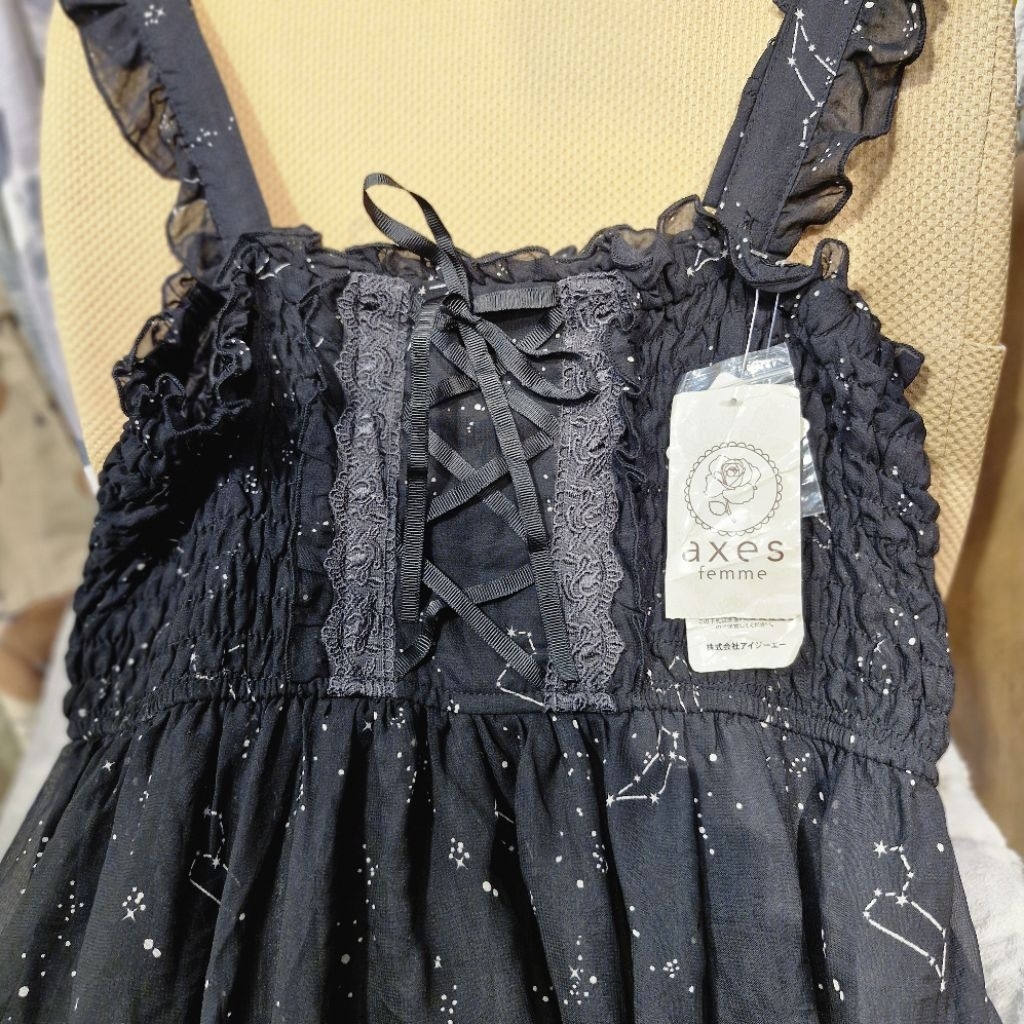 axes femme (ป้ายห้อย)