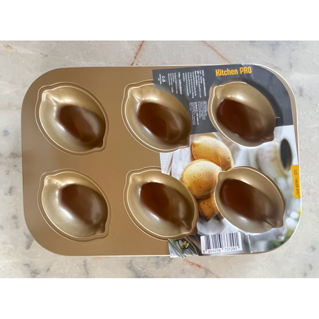 แม่พิมพ์เค้กเทฟร่อนสีทอง รูปเลม่อน ขนาด 18*26 ซม.