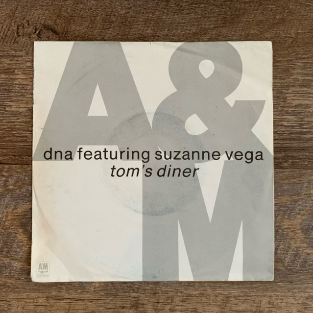แผ่นเสียง DNA ft. Suzanne Vega – Tom’s diner vinyl lp 7”(VG+)