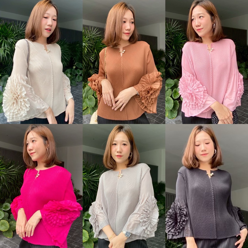 เสื้ออัดพลีทก้างปลา📌คอวายดีไซน์เก๋ๆมีเข็มกลัดแขนแต่งพุ่มดอกกุหลาบสวยมาก ไซค์ใหญ่ใส่สบายค่ะ