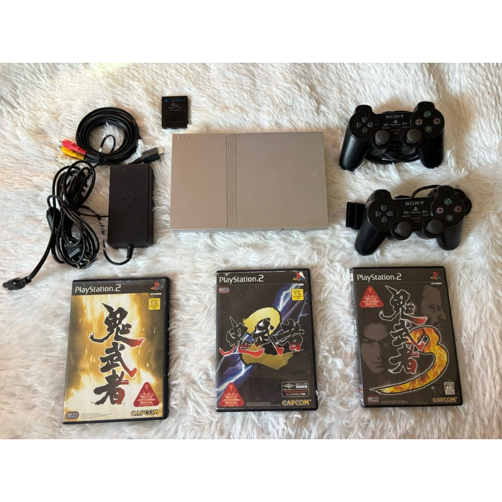 PS2 รุ่น7 สีเงิน อ่านแผ่นแท้ เครื่องไม่เคยแกะ