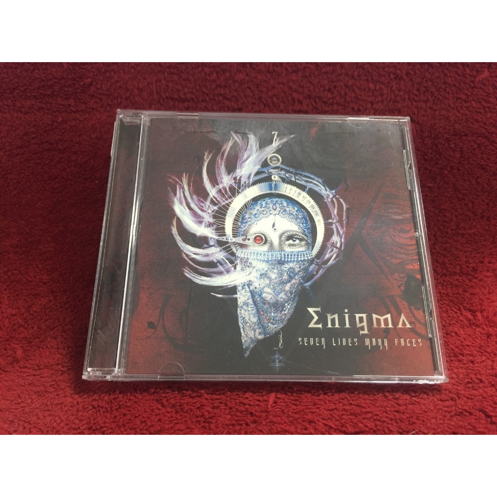 CD Enigma – Seven Lives Many Faces สภาพตามปก (ปกเปียก)  CA30-117