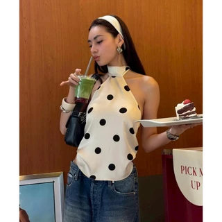 BY IRA (2025.87)Veronica Top เสื้อคอเต่าแขนกุด ลายจุด สีพื้น มีสายผูกด้านหลัง ทรงปล่อยสวมใส่สบายตัว แมทซ์ได้หลายลุค