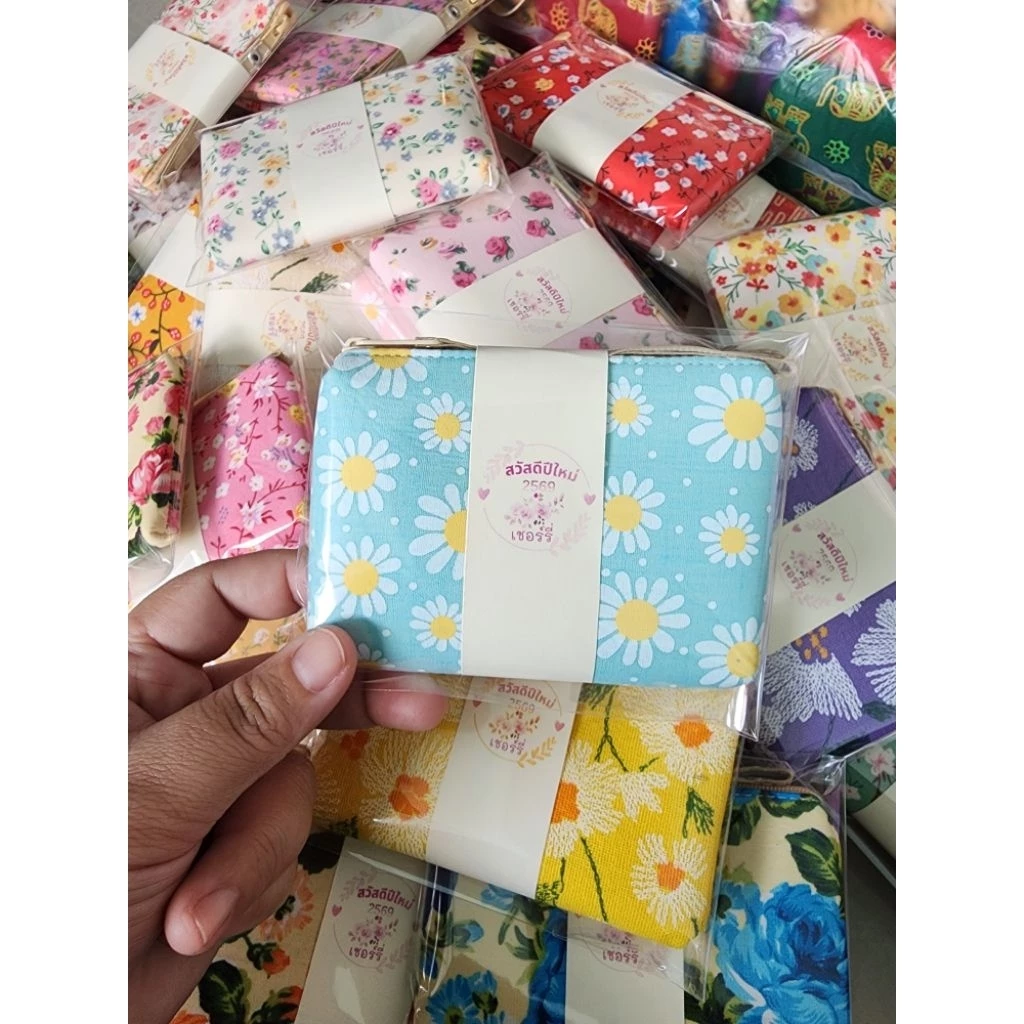 กระเป๋ามีสายคล้องลายเดซี่