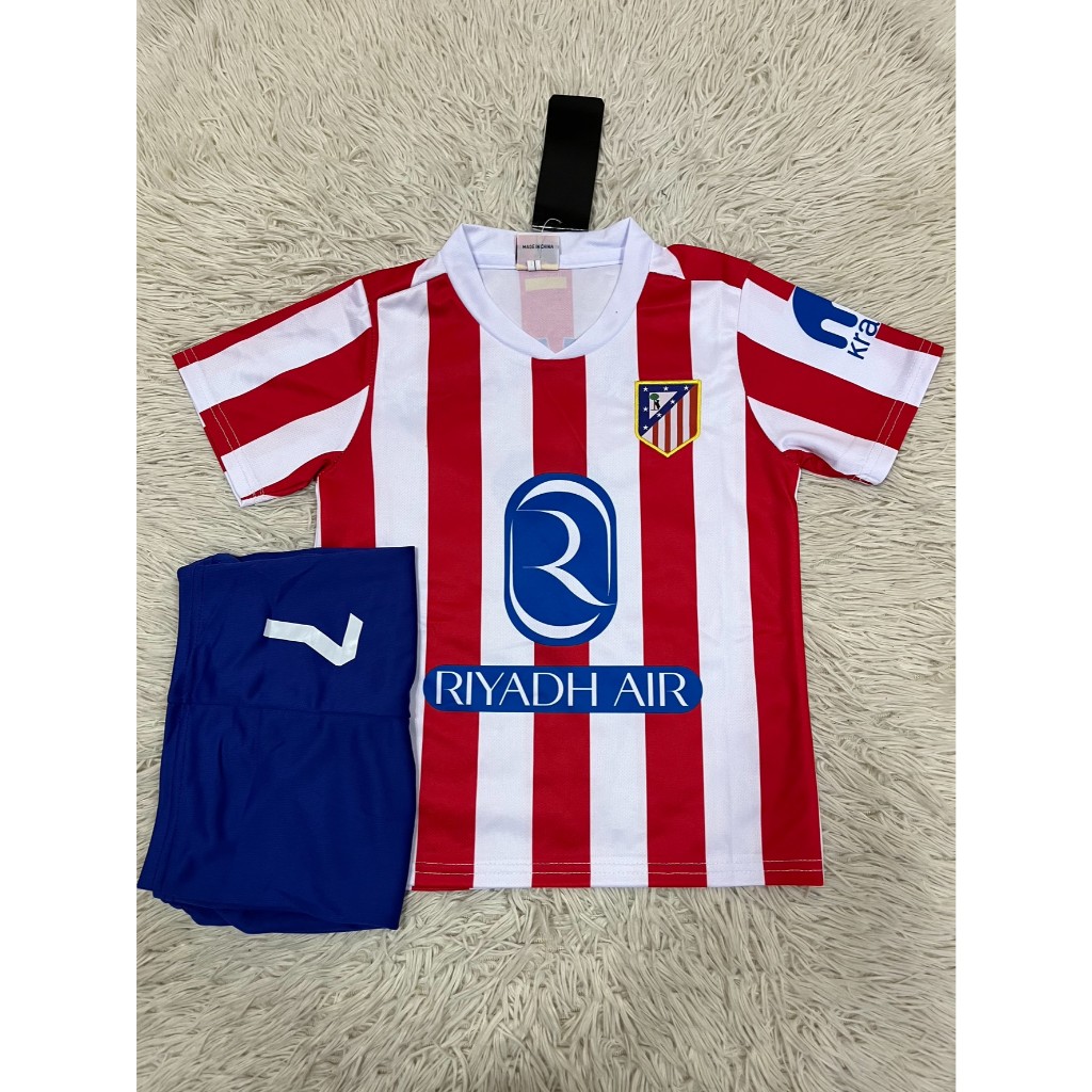 เสื้อกีฬาเด็ก ใหม่ล่าสุดทีมเเอตเลติโกเบอร์7ชื่อกรีซมันน์ เสื้อ+กางเกง ปี2026 ป้ายงานปัก