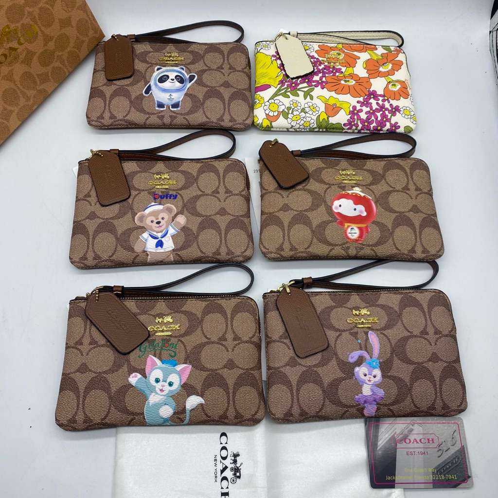Sale กระเป๋าคล้องมือ ลายใหม่สวยน่ารักกำลังฮิตขนาด 6.5 นิ้วราคาโปรพิเศษงานสวยมีอุปกรณ์ครบพร้อมกล่อง