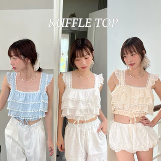 RUFFLE TOP - เสื้อแขนกุด ดีเทลแขนระบาย และจับระบายช่วงตัวเสื้อ (nita.bkk)