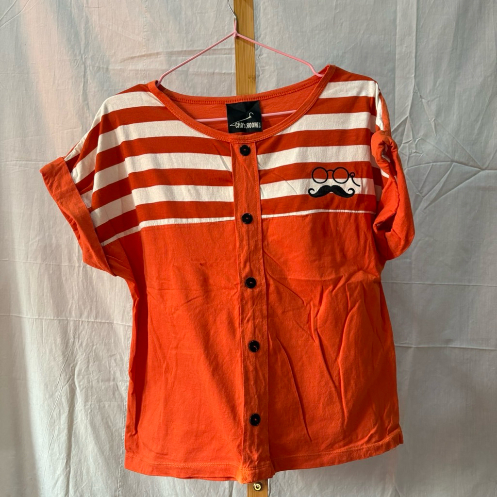 (มือสอง) เสื้อยืดสีส้มคอกลมแต่งลายขาว อก 34 นิ้ว ยาว 26 นิ้ว ราคาถูก Shopee Lazada