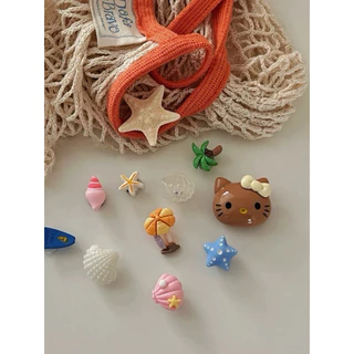 ร้านไทย พร้อมส่ง 🐚🌴🪸 ตัวติดรองเท้าเซ็ตคิตตี้ธีมทะเล 12 ชิ้น (n.30)