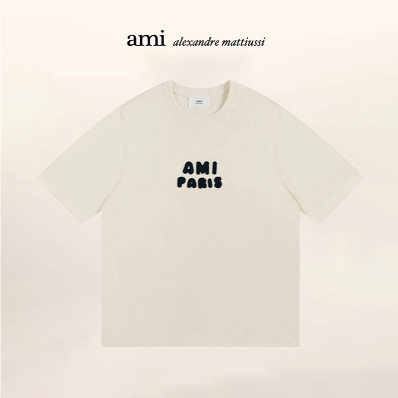 【AMI Paris 】 ปักตัวอักษรแขนสั้น สินค้าแท้AMI ใหม่ตัวอักษรถักหลวมรอบคอปกเสื้อแขนสั้นชาย และหญิง