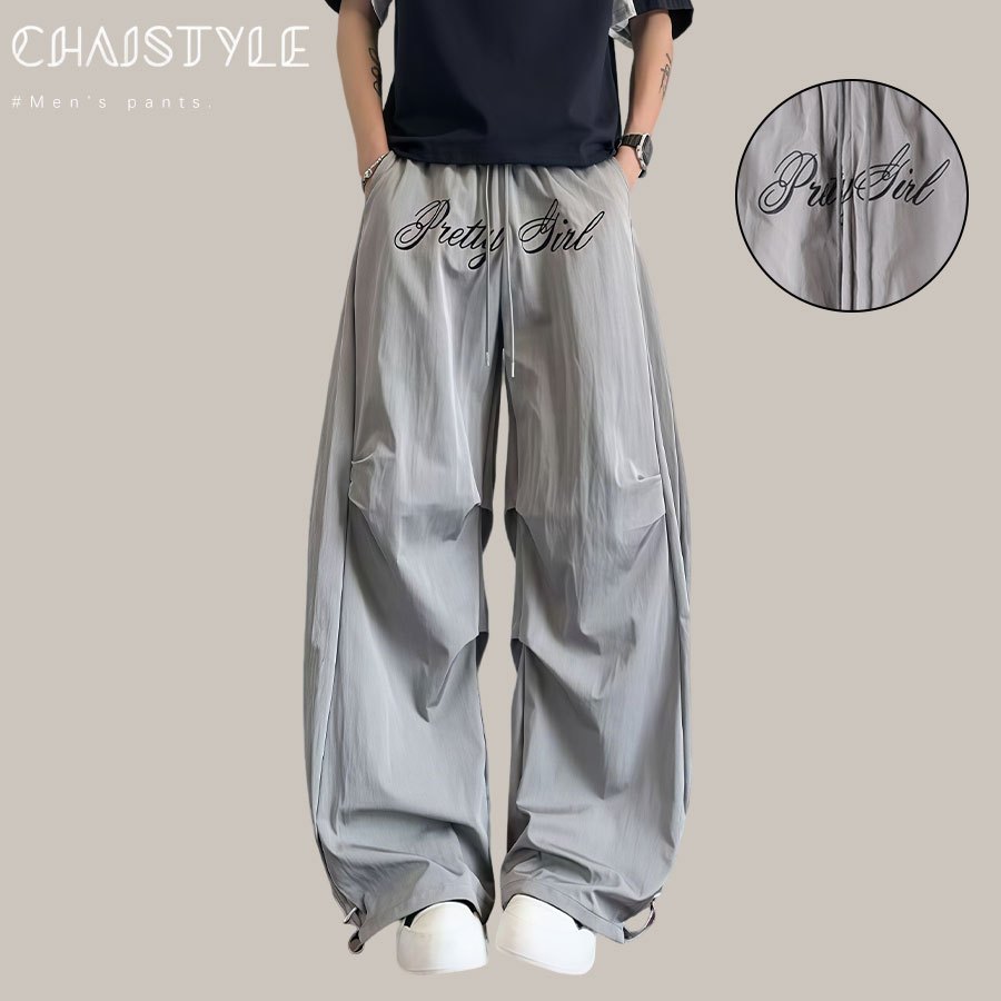 Chaistyle สไตล์อเมริกัน ลายปักตัวอักษร กางเกงเวิร์คแวร์ ผ้าร่ม ขากว้าง เอวยางยืด ความรู้สึกของการออกแบบพับรุ่นชายและหญิง