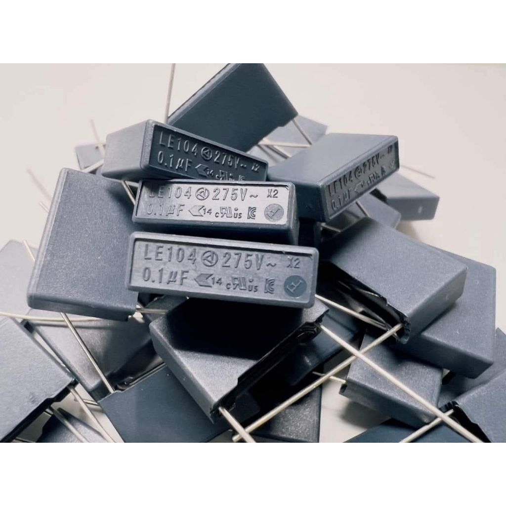 Okaya LE104 XL  0.1 uF 275v x2 ระยะขา 15 มม.