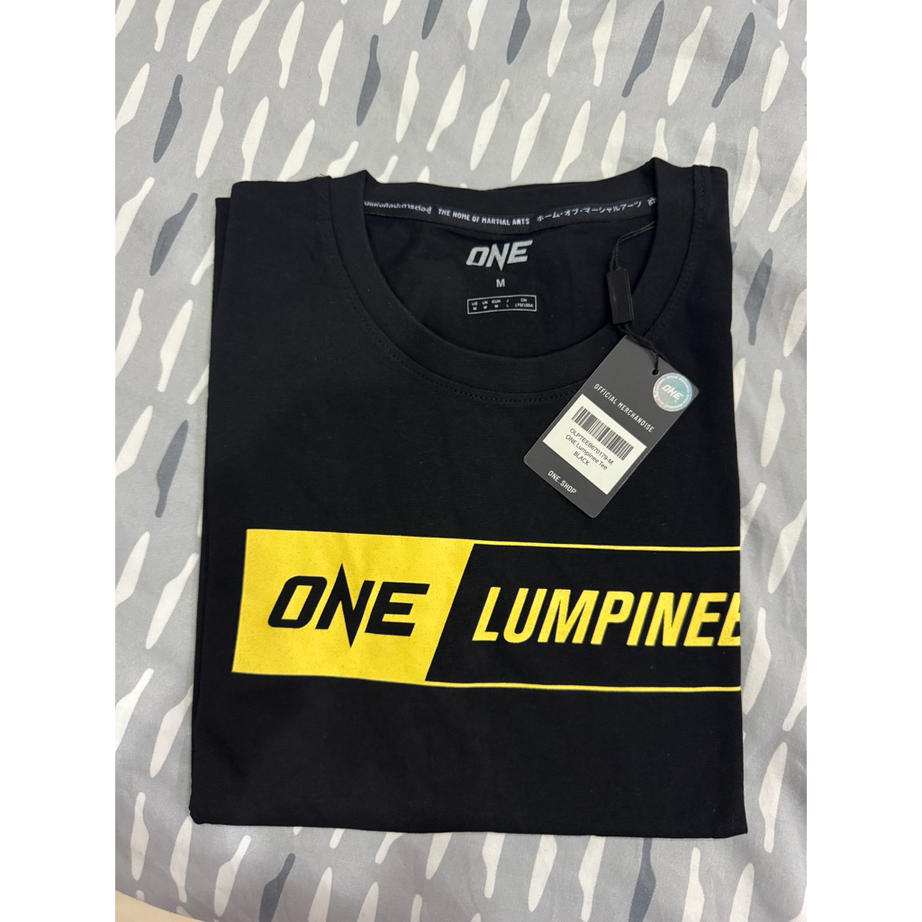 Original ONE Championship t-shirt features a bold gold and black "ONE LUMPINEE" graphic