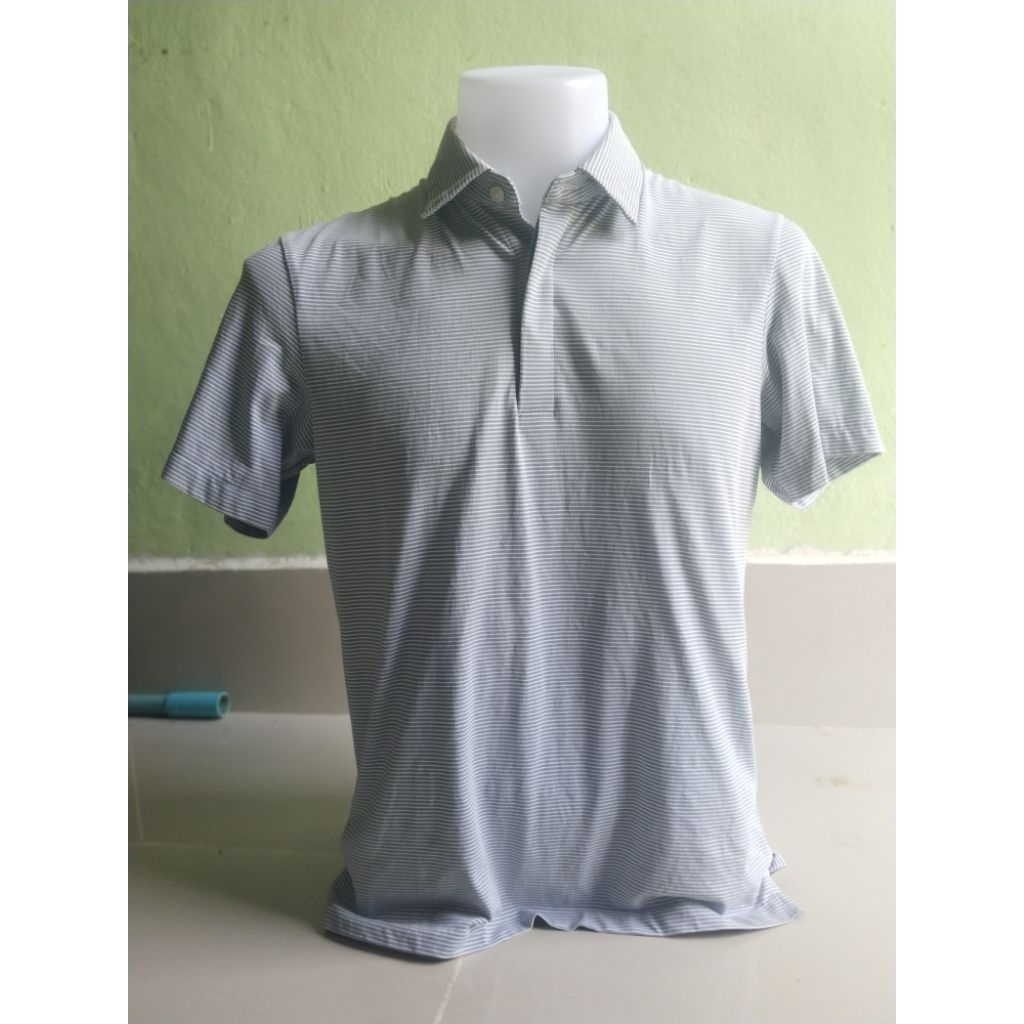 เสื้อโปโล Uniqlo  สีเทาลายทางสีขาวอก 40 ยาว 26 มือสอง