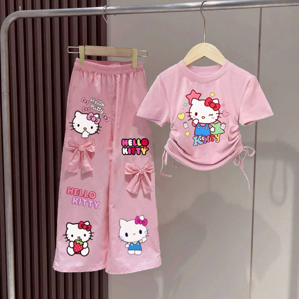 PINK ชุดเซ็ทเด็ก เสื้อผูกโบว์ข้างลายการ์ตูน+กางเกงแต่งโบว์
