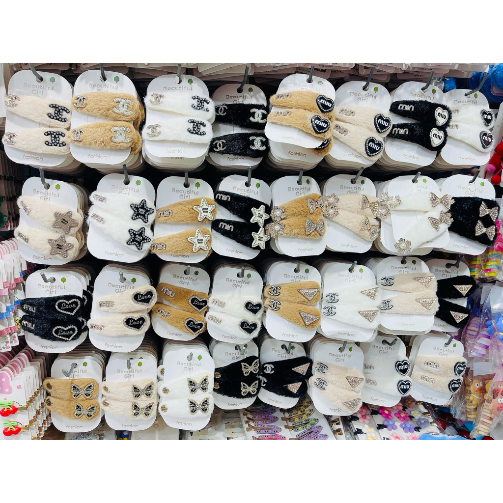 กิ๊บติดผมงานแกรม1โหลมี24ชิ้นคล่ะสีคล่ะลาย