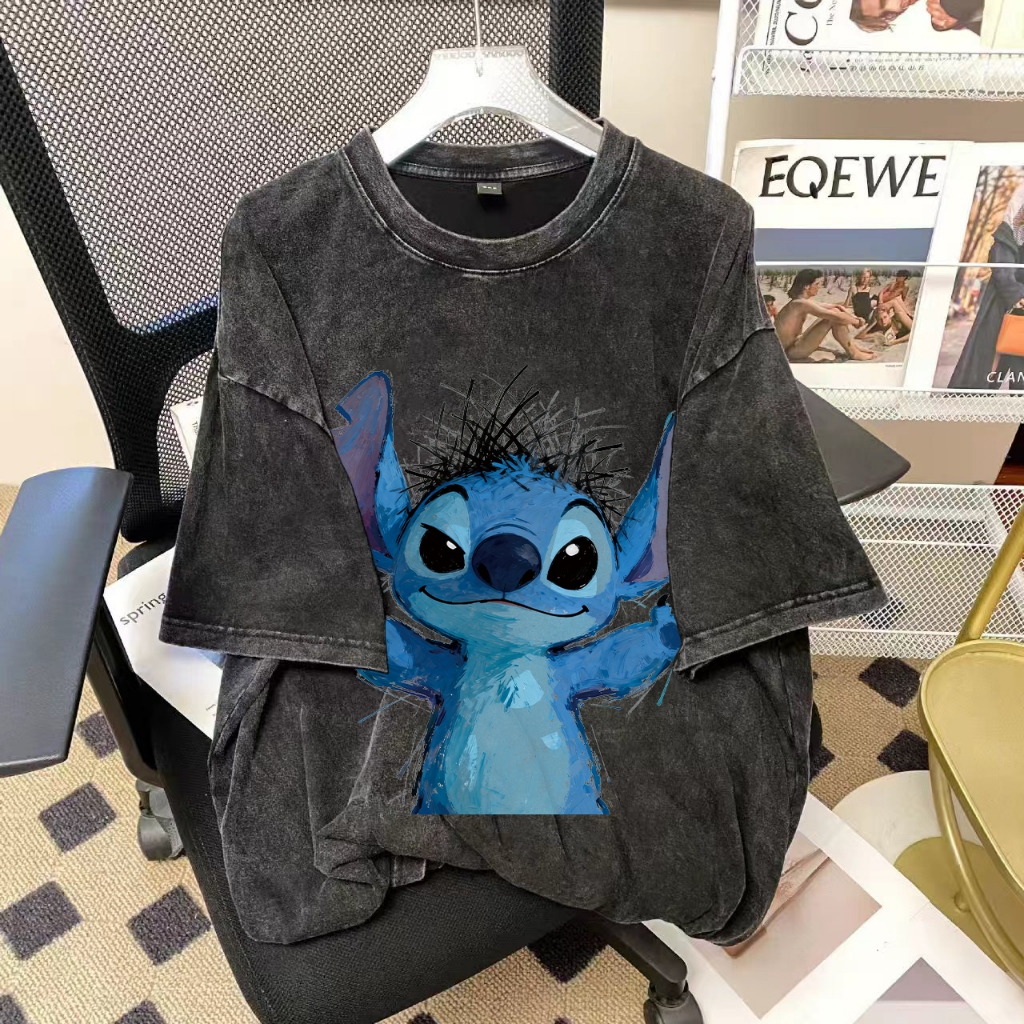 เสื้อยืดแขนสั้นผ้าฝ้ายแท้น้ำหนักสูงคุณภาพสูงลายการ์ตูนวาดด้วยมือหลวมสำหรับผู้ชายและผู้หญิงเสื้อลำลองอเนกประสงค์