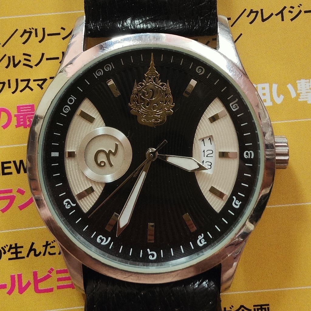 นาฬิกาวินเทจ Wise ตราสัญลักษณ์ ภปร ร.9 หน้าดำยอดนิยม มือสองสภาพสวย ระบบควอตซ์ สายใหม่หนังนกกระจอกเทศ