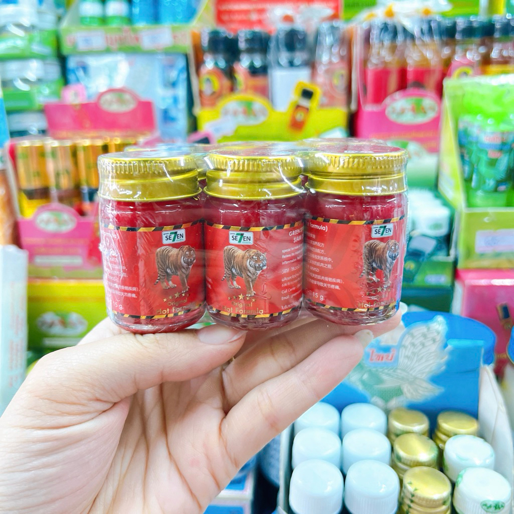 [จำนวน 6 ขวด มี 2 ขนาด 15g./50g.] ยาหม่องเสือแดง Thai Blam Green seven strong Hot formula