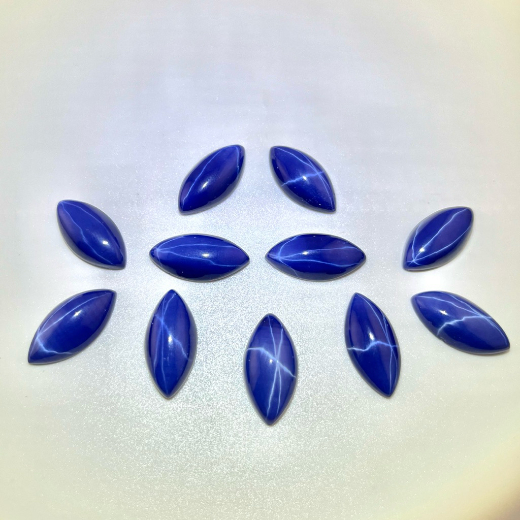 ลิลลี่ สตาร์ สีน้ำเงิน พลอย (พลอยสั่งเคราะเนื้อแข็ง) ทรงมาคี หลังเบี้ย มี ลาย BLUE LINDY STAR MARQUISE (4x8mm – 6x12mm) ราคา ถูกที่สุด ดีลบีเคเค แกลเลอรีภาพที่ 2