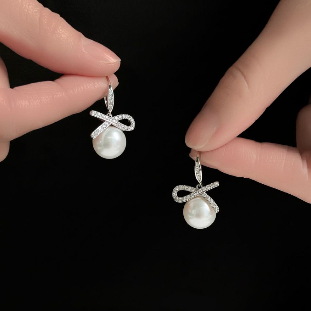 ESCOBAL ต่างหูไข่มุก Pearl Bow ต่างหูไข่มุก ต่างหูเงินแท้ฝังเพขร ตุ้มหูไข่มุกขาว Valentine ของขวัญ ราคา ถูกที่สุด ดีลบีเคเค แกลเลอรีภาพที่ 5