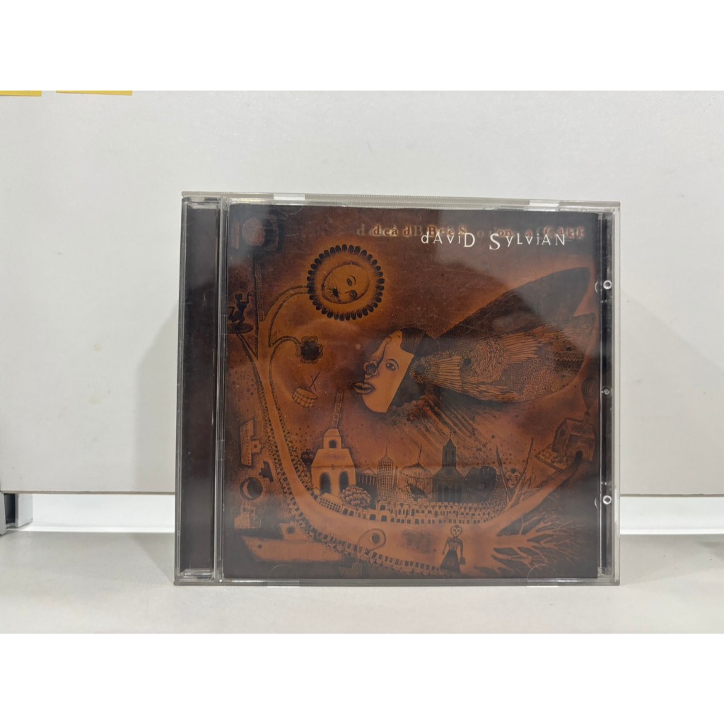 1 CD MUSIC  ซีดีเพลงสากล     Dead Bees on a Cake by David Sylvian   (A5C9)