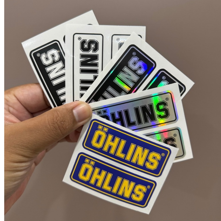1 คู่ ลาย OHLINS ขนาด 2.7 x 6.9 cm. สติ๊กเกอร์ ติดโช๊ค ติดกระป๋องโช๊ค รถมอเดอร์ไซค์ แต่งโช๊ค ราคา ถูกที่สุด ดีลบีเคเค แกลเลอรีภาพที่ 2